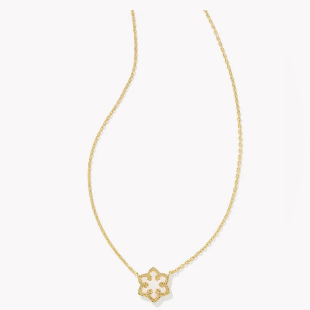 Snowflake gold short pendant.